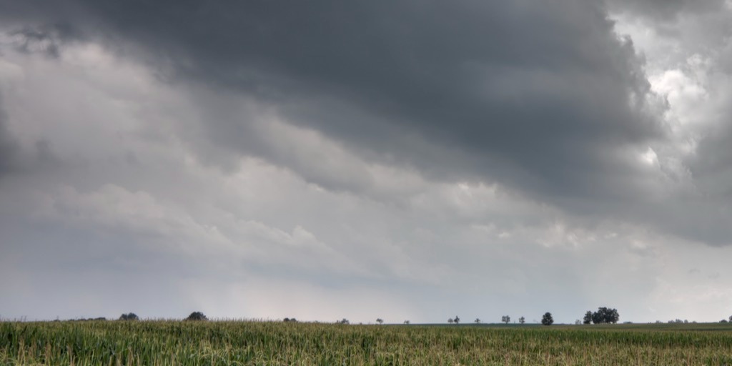 Rain cloud over farm